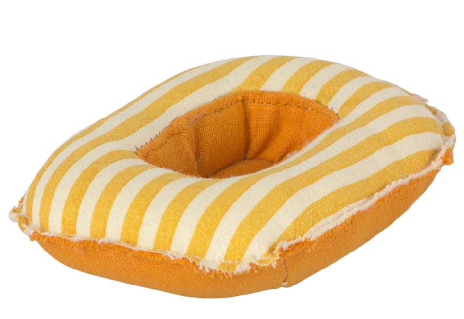 Introducing the Maileg Rubber boat, Small mouse - Yellow stripe by Maileg: a small fabric toy donut with cheerful yellow and white stripes on top and a solid orange bottom, accented by visible edge stitching—ideal for imaginative play or as a charming accessory for your Small Mouse’s miniature rubber boat adventures.