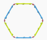 A hexagon is formed by alternating blue and yellow-green interlocking Nockles - Loop plastic sticks from Fun in Motion, with small purple and red connectors at the corners, creating a vibrant sensory toy that offers satisfying tactile feedback.