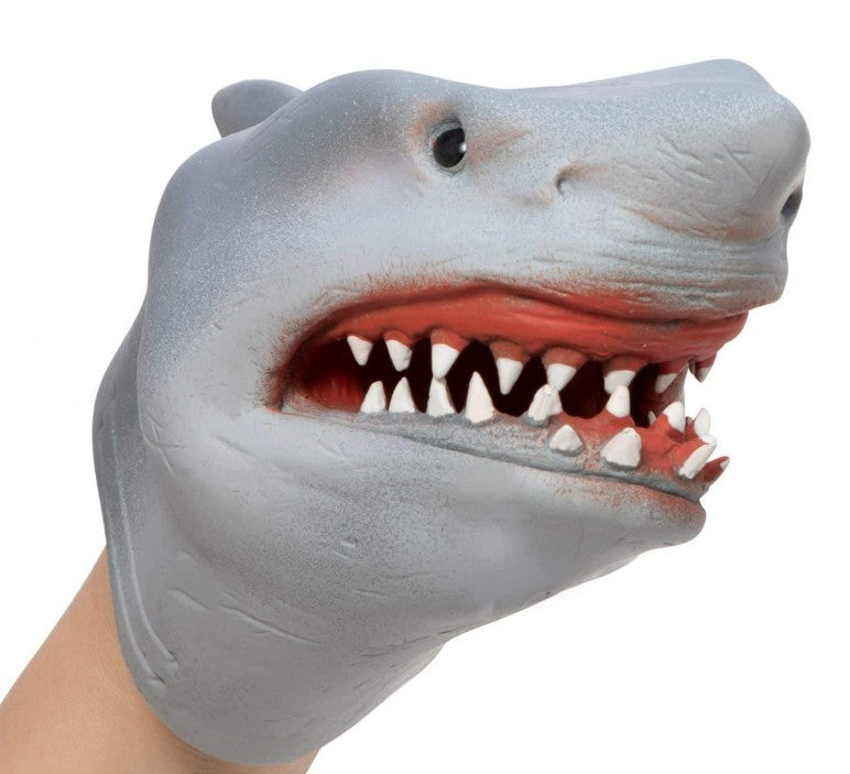 A person is wearing the Schylling Toys Shark Hand Puppet in gray, featuring an open mouth with sharp white teeth and pink gums—perfect for imaginative play and entertaining puppet shows.