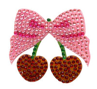 Add some sparkle to your planner accessories or collection of cute stickers with the StickerBean Cherry Bow by StickerBean—a pink rhinestone bow featuring two cherries adorned with red and green rhinestones, perfect for anyone who loves a touch of bling.