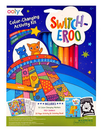 Ooly’s Switch-eroo!: Color-Changing Activity Kit comes in a vibrant box featuring two cartoon cats traveling along a rainbow path under a starry night sky. This kit includes creative art materials—color-changing markers, stickers, and a coloring book—that make each child’s masterpiece unique and are perfect for kids who love exploring their creativity.