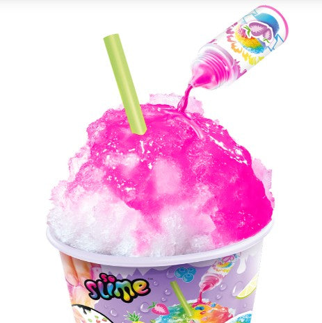 A cup of So Slime Ice Slime Mini Cup by License 2 Play is being topped with bright pink syrup from a bottle. A green straw is inserted into the ice, and the playful cup features colorful fruit and slime graphics for extra sensory fun.
