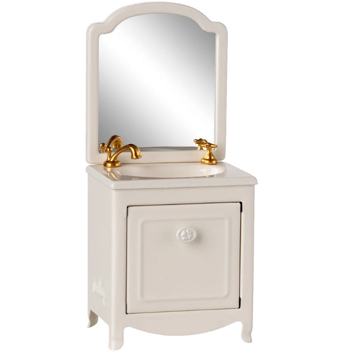 The Maileg Sink Dresser, Mouse - Off White by Maileg is a charming vintage-style vanity with a gold faucet, rectangular mirror, and cabinet—ideal for Maileg bathroom setups or as a whimsical sink for mouse-sized imaginative play.