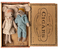 Maileg Mum & Dad Mice In Cigarbox by Maileg features two mice wearing sleepwear and masks, nestled together in a cozy cigar box bed.