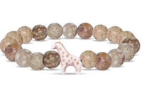 The Trek - Moon Giraffe bracelet by fahlo features earth-toned stone beads and a ceramic giraffe charm—an ideal accessory for giraffe lovers and conservation supporters.