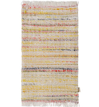 The Maileg Rug, Miniature, Large - Multi stripe by Maileg features a handwoven rectangular design with horizontal stripes in yellow, white, and touches of red and black. With its textured surface and fringed edges at the top and bottom, it’s the perfect miniature rug for a Maileg dollhouse.