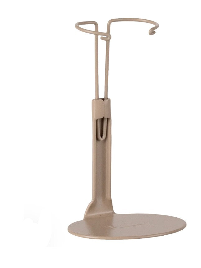 The Maileg Stand, Small - Mouse Sand by Maileg features a beige upright design with a flat circular base and curved hook—ideal for displaying Maileg Mice or adding charm to your dollhouse collection.