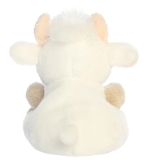 The 5" Halleigh Highland Cow from Aurora is a plush toy shaped like a white Highland cow, shown from the back and featuring small ears, stubby horns, a short tail, and beige hooves—making it an adorable collectible toy for fans of stuffed animals.