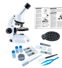 The Thames & Kosmos Microscope with Smartphone Adapter includes slides, bottles, tweezers, prepared samples, and more—offering hands-on STEM learning—all neatly arranged on a white background.