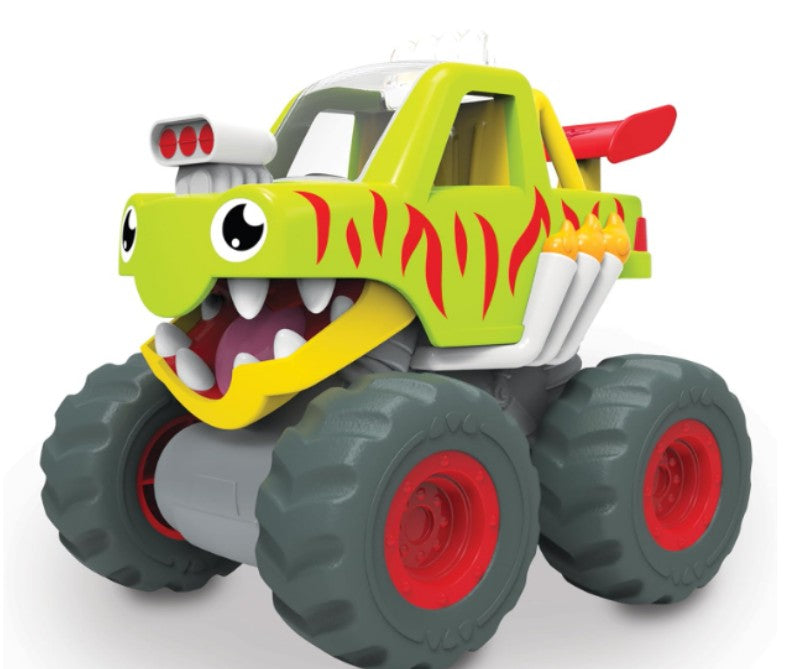 The Smart Toys Mack Monster Truck features a green body, big tires with red rims, cartoon eyes, a wide mouth, and flame decals—perfect for sparking imaginative play and encouraging motor skill development.