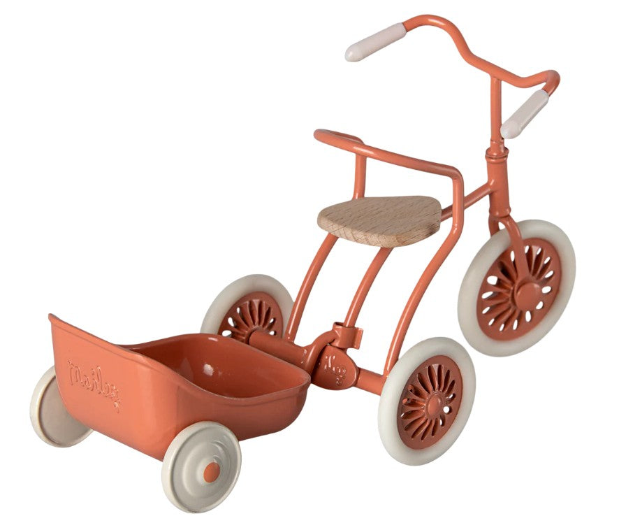 The Maileg Tricycle Hanger, Mouse - Coral by Maileg features a charming vintage style with a wooden seat, attached rear cart, and matching coral color—ideal for enhancing your mouse accessories collection.