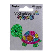Introducing StickerBean Taylor by StickerBean—a vibrant rhinestone decorative sticker featuring a turtle with a green head, pink legs, and a multicolored shell, showcased on packaging labeled “StickerBeans Squad” and “Rhinestone Sticker.” Perfect for planners or adding sparkle to any collection.