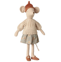 The Maileg Mouse, Medium - Skirt and Sweater by Maileg is a delightful medium-sized toy, perfect for imaginative play, featuring a mouse standing upright dressed in a brown knit hat, cream sweater, floral skirt, and brown shoes.