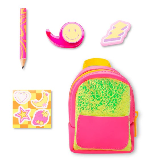 The Moose Toys - Real Littles Charms Backpacks by Toysmith includes a mini neon backpack collectible, a pencil, three adorable erasers (smiley face, lightning bolt, and speech bubble), and a small sticky note pad adorned with fruit and heart designs—all beautifully arranged on a white background. Perfect for fans of miniature surprises and collectible charms backpacks!.