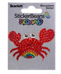 A sparkly red crab sticker named StickerBean Scarlette, featuring large eyes, a cheerful smile, and a rainbow detail on its body, is displayed on a card labeled with the StickerBean brand. This playful character design makes it the perfect decorative sticker for adding fun to your collection.