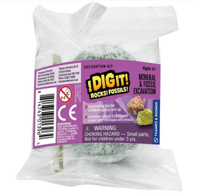 The Thames & Kosmos I Dig It! Rocks & Fossils Mini Excavation is a small kit in clear packaging with a purple label. Great for aspiring paleontologists ages 5+. Warning: choking hazard— not for children under 3.