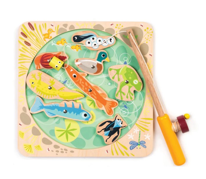 Pond Dipping by Tenderleaf is a colorful wooden fishing game with a rod and painted pond creatures—fish, duck, frog—set on a square pond-themed board for fun, nature-inspired play.