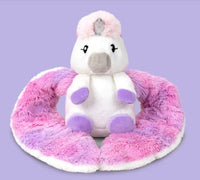 Hugimals World's Hugarounds Echo the Unicorn is a plush toy with a silver horn, purple hooves, closed eyes, and fluffy pink and purple wings, offering sensory comfort against a solid light purple background.