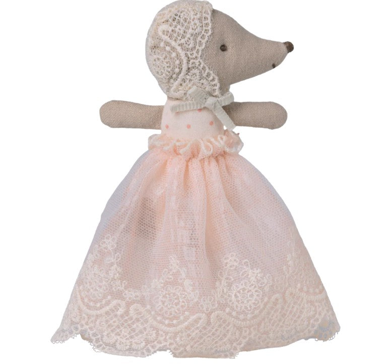The Maileg Baby Mouse In Gown - Powder by Maileg features a tiny mouse in a pink dress and bonnet, standing with outstretched arms and detailed stitching—ideal for imaginative play.