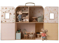 Bring home the Maileg SuitCasa, Little Sister and Brother Mouse set by Maileg—a charming mouse dollhouse featuring two mouse dolls, four intricately designed rooms, mini furniture pieces, and beautifully wallpapered walls for hours of imaginative play. Find Little Brother Mouse relaxing in the kitchen while Little Sister Mouse snuggles up in the bedroom’s bunk beds. For added fun and adventure, pair your SuitCasa with more Maileg accessories or tuck it into a miniature suitcase for on-the-go play!.