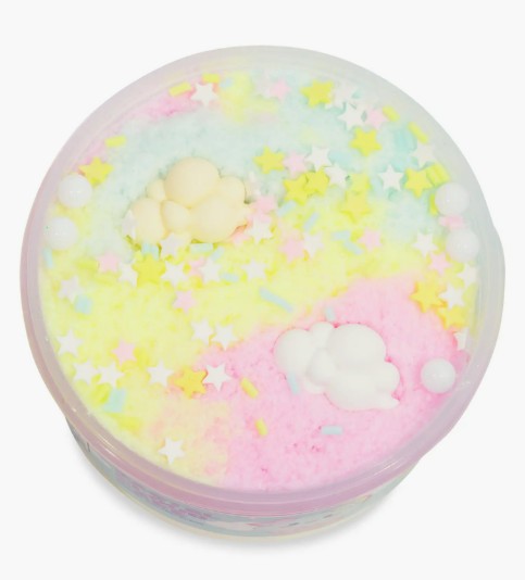 The Peachybbies Slime Pastel Cloud Cake Slime comes in a round container filled with yellow, pink, and blue pastel-colored fluffy slime that blend together for a dreamy effect. It is topped with star-shaped sprinkles and two small cloud-shaped decorations, offering a soft, cloud-like texture perfect for satisfying slime ASMR experiences.