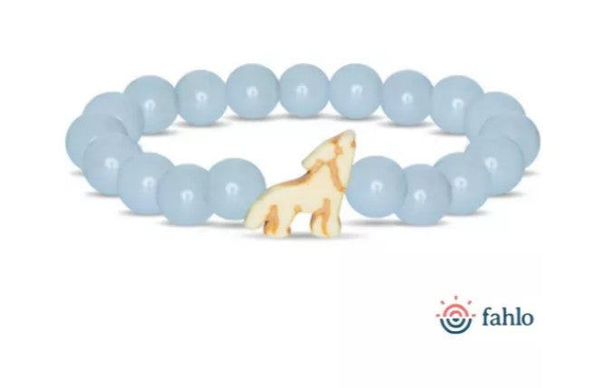 The Scout - Aqua Glow Wolf bracelet by fahlo features light blue round beads and a central howling wolf charm, supporting wildlife conservation. The fahlo logo appears in the bottom right corner.