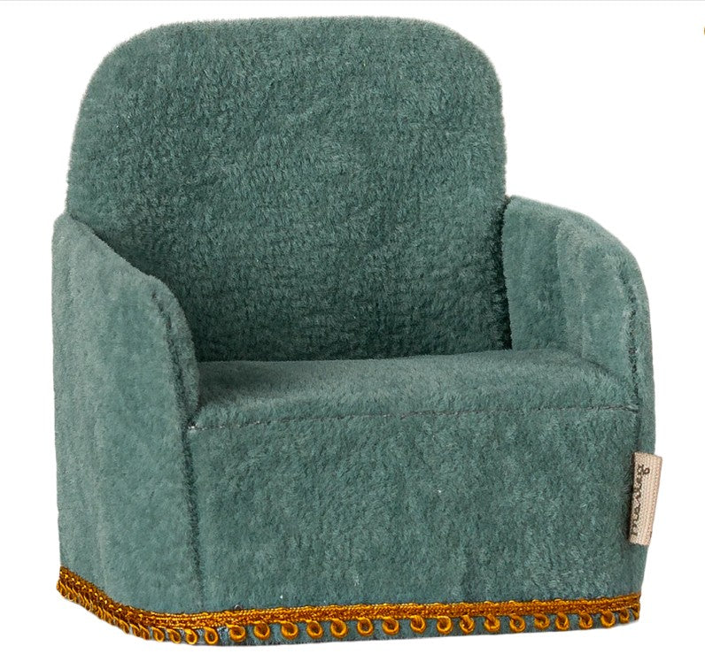 The Maileg Folding Chair, Mouse - Mint by Maileg is a small, plush mint armchair with a soft texture and gold trim, ideal for your Maileg Mouse accessories collection. Displayed against a white background.