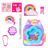 Introducing the Toysmith Moose Toys Real Littles Liquid Charms Backpacks—a vibrant unicorn-themed set featuring stickers, notepad, eraser, rainbow pen, carabiner, flower-shaped sharpener, and a plush rainbow backpack with a transparent paw-shaped window showcasing an adorable unicorn figure inside. Uncover extra excitement with hidden surprise miniature accessories inside this collectible mini backpack—the perfect choice for fans of adorable surprises and fun stationery!.