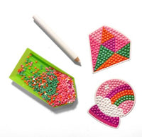 Experience creative fun with the Ooly Mini Razzle Dazzle: D.I.Y. Gem Sticker Kit - Magic! This colorful diamond painting set includes a green tray for gem pieces, a white stylus, and two magical-themed sticker sheets—a geometric shape and a rainbow inside a snow globe—with gems partially applied. Everything you need is in this mini craft kit, making it the perfect gem sticker activity for crafters of all ages!.