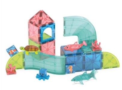 Bring underwater adventures to life with the Magna-Tiles Coral Reef 25-Piece Set by Magna-Tiles. Vibrant magnetic building pieces come together to create tunnels and structures, surrounded by toy sea creatures like a turtle, fish, octopus, shark, and colorful coral decorations—ideal for imaginative ocean-themed play.
