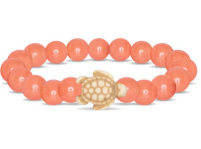The Journey - Sunrise Glow Sea Turtle bracelet by fahlo features round, coral-hued beads and a cream turtle charm—a perfect accessory for sea turtle conservation supporters.