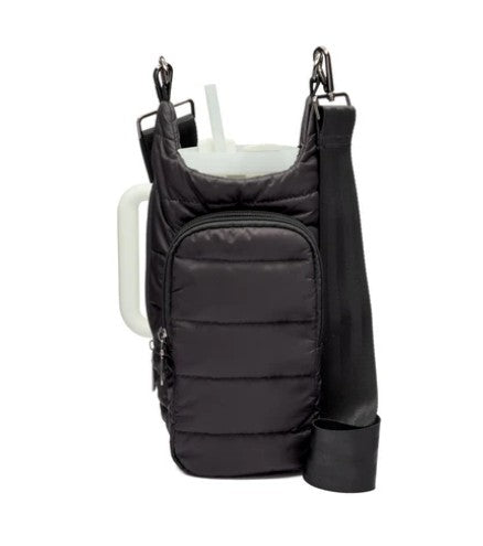 Introducing the Wander Full Brand HydroBag Handle Black: a black, quilted, insulated bag with a zippered front pocket, designed to hold a large cup with a straw and featuring the signature HydroBag handle for easy carrying. The bag is equipped with a wide, adjustable black shoulder strap for added comfort and convenience.