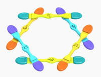 Nockles - Digit by Fun in Motion features six colorful, hinged plastic links—each labeled with a number or symbol—that form a circular shape. Connecting blue, orange, purple, teal, and yellow segments, this engaging sensory toy is designed for stress relief.
