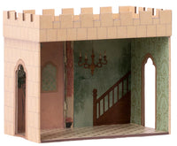 Transform your miniature castle playset with the Maileg Castle hall, Mouse by Maileg—a cardboard dollhouse room featuring tiled floors, green wallpaper, a painted staircase, ornate chandelier, arched windows, and a castle-inspired exterior complete with battlements on top. Perfect for displaying charming Maileg mice accessories!.