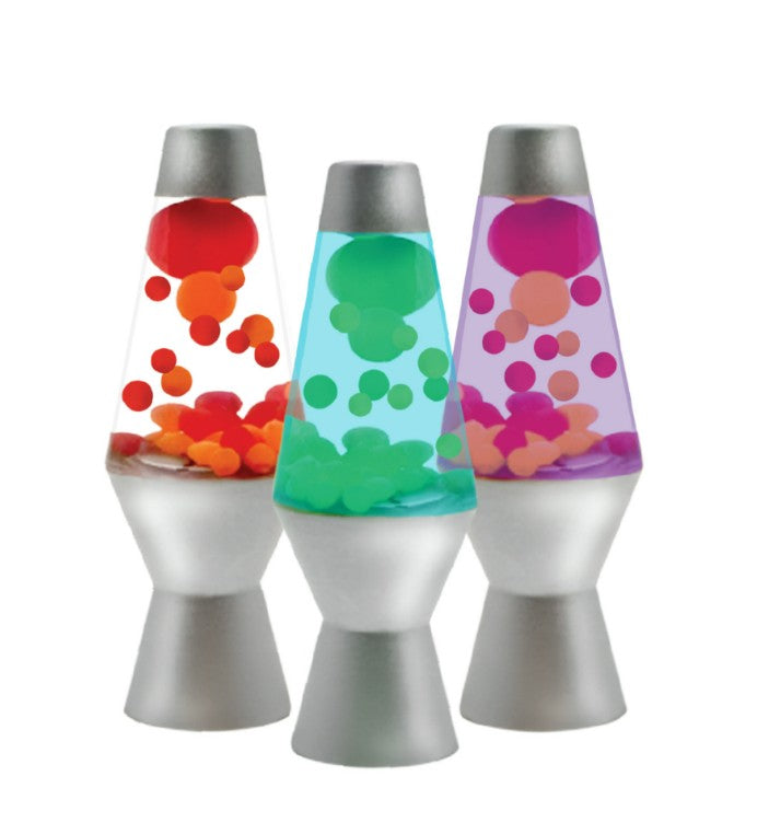 Three Schylling Toys Lava Squish n Flow lamps in a row—one with red blobs in orange liquid, one with green blobs in blue liquid, and one with purple blobs in pink liquid—all glowing brightly to create the perfect sensory toy for stress relief.