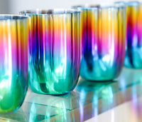The ahimsa Rainbow Conscious Cups (8 oz) come in packs of 4 with a vibrant iridescent gradient. Made from reusable stainless steel, these cups offer a striking, modern look perfect for any setting.