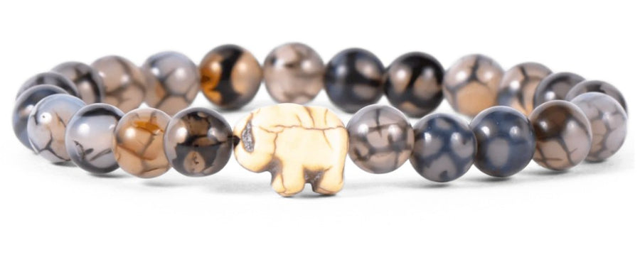 The Expedition - Keystone Elephant bracelet by fahlo features round, marbled brown and gray stones and a central cream-colored elephant bead—perfect for supporting elephant conservation.