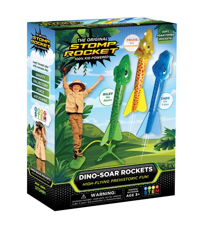 Box of D&L Stomprocket Dino-Soar Stomp Rocket Kit, featuring three dinosaur-shaped foam rockets and a boy in a safari outfit. The packaging highlights “100% kid powered” and “High-flying prehistoric fun!”—a great introduction to STEM learning, perfect for ages 3 and up.