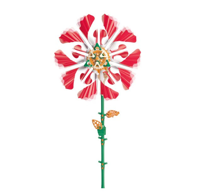The SolarFlower - Ruby Ripple by Thames & Kosmos is an engaging educational toy, featuring vibrant red and white petals with a green stem constructed from interlocking plastic pieces. Displayed against a white background, it sparks creativity and introduces concepts of design and learning.