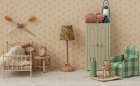 A miniature vintage-style bedroom includes a small bed, nightstand, lamp, alarm clock, green plaid armchair, wardrobe, charming wall decor, and the Maileg Thermos And Cups (Mouse - Mint)—perfect for dollhouse play or Maileg Mouse accessories.