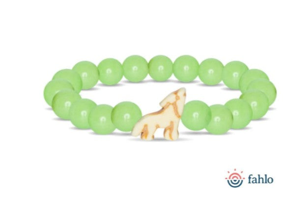 The fahlo Scout - Sage Glow Wolf is a glow-in-the-dark bracelet featuring light green round beads and a central wolf-shaped charm. The fahlo logo appears in the bottom right corner.