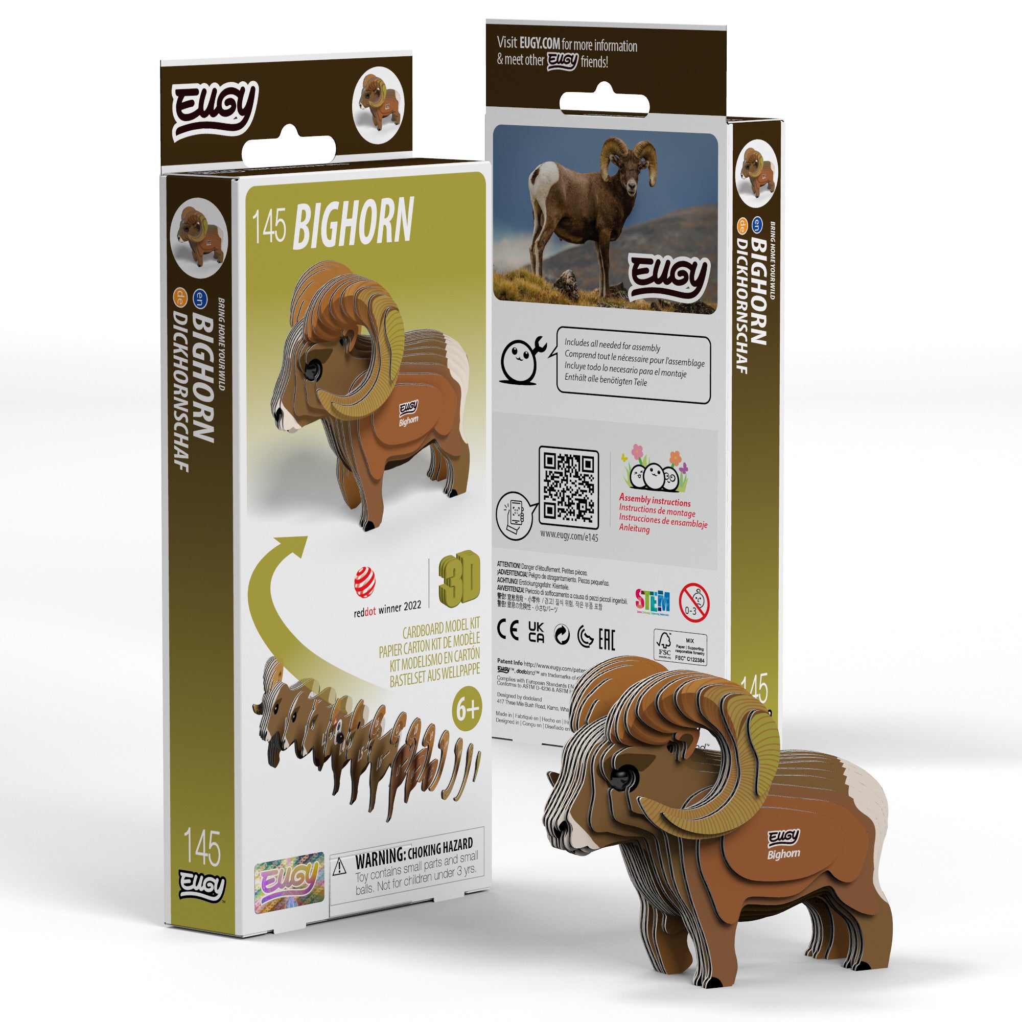 A partially assembled EUGY Bighorn 3D Puzzle by Eugy stands in front of its packaging, which displays the finished bighorn sheep model, product details, safety warnings, and an image of a real bighorn sheep.