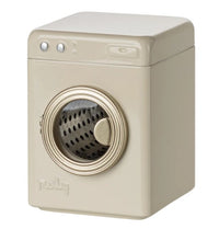 The Maileg Washing Machine, Mouse – Off white is a rectangular miniature washing machine by Maileg, featuring a beige color with a round, clear metallic-finished door and two buttons on top. The visible perforated drum and simple molded details make it perfect for Maileg mouse accessories or as a charming addition to your collection.