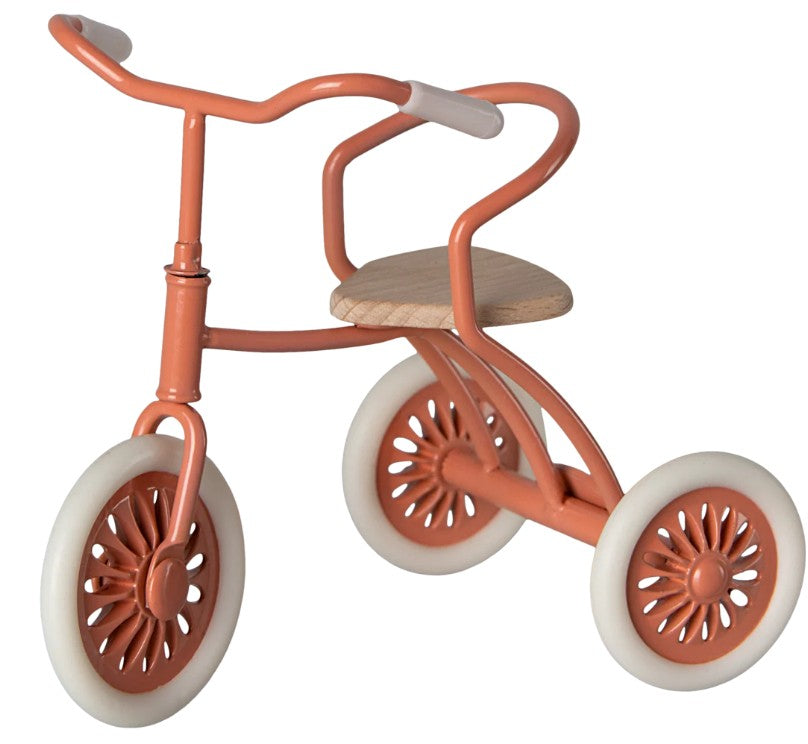 The Maileg Tricycle Garage (Coral) by Maileg features a vintage-style, rust-colored metal frame with white tires and a round wooden seat—ideal for your Maileg Mouse accessories. Shown isolated on a white background.