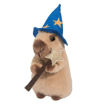 The Douglas Wizard Capybara plush stands upright against a white background, wearing a blue wizard hat with yellow stars and holding a glittery star wand—a magical addition to any capybara or wizard plush collection.
