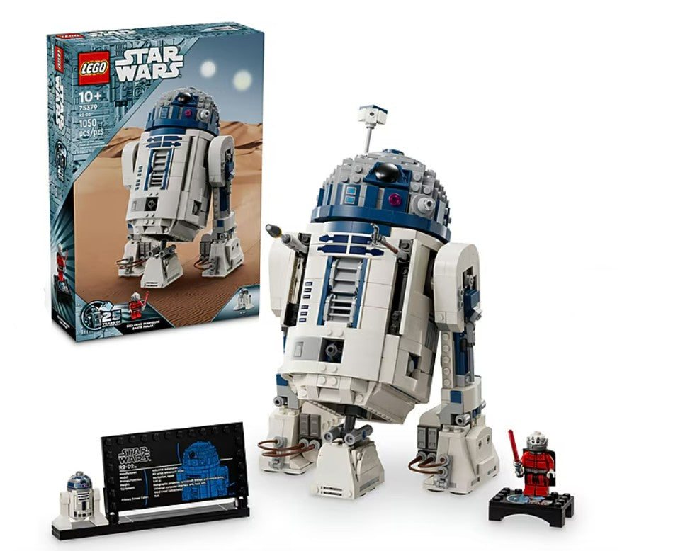 The LEGO R2-D2 by LEGO features a buildable R2-D2 figure, a small minifigure, a display plaque, and the product box in the background—making it an ideal Star Wars building set for fans and a perfect collectible display model for any enthusiast.