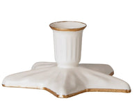The Maileg Candle Holder, Star, Small by Maileg is a white, star-shaped decorative piece with gold trim along the edges and opening. Featuring a fluted cup design and a flat, wide star-like base, this charming candle holder adds an elegant touch to any décor.