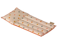 The Maileg Air mattress, Mouse - Multi dot by Maileg is a rectangular, padded fabric mat with a built-in pillow, featuring a beige background with multicolored polka dots and orange edging—perfect as an air mattress for pretend play with your Maileg mice or as a cozy miniature mattress for your favorite little friends.