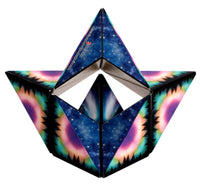 The Shashibo - Moon by Fun in Motion is a geometric puzzle cube shaped like a star, featuring night sky artwork with vibrant auroras and pine tree silhouettes on each triangular face, showcasing celestial-inspired designs.