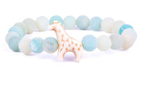 The fahlo Trek - Sky Stone Giraffe bracelet features alternating pale blue and white beads with a central giraffe charm—an ideal way to show your support for giraffe conservation.